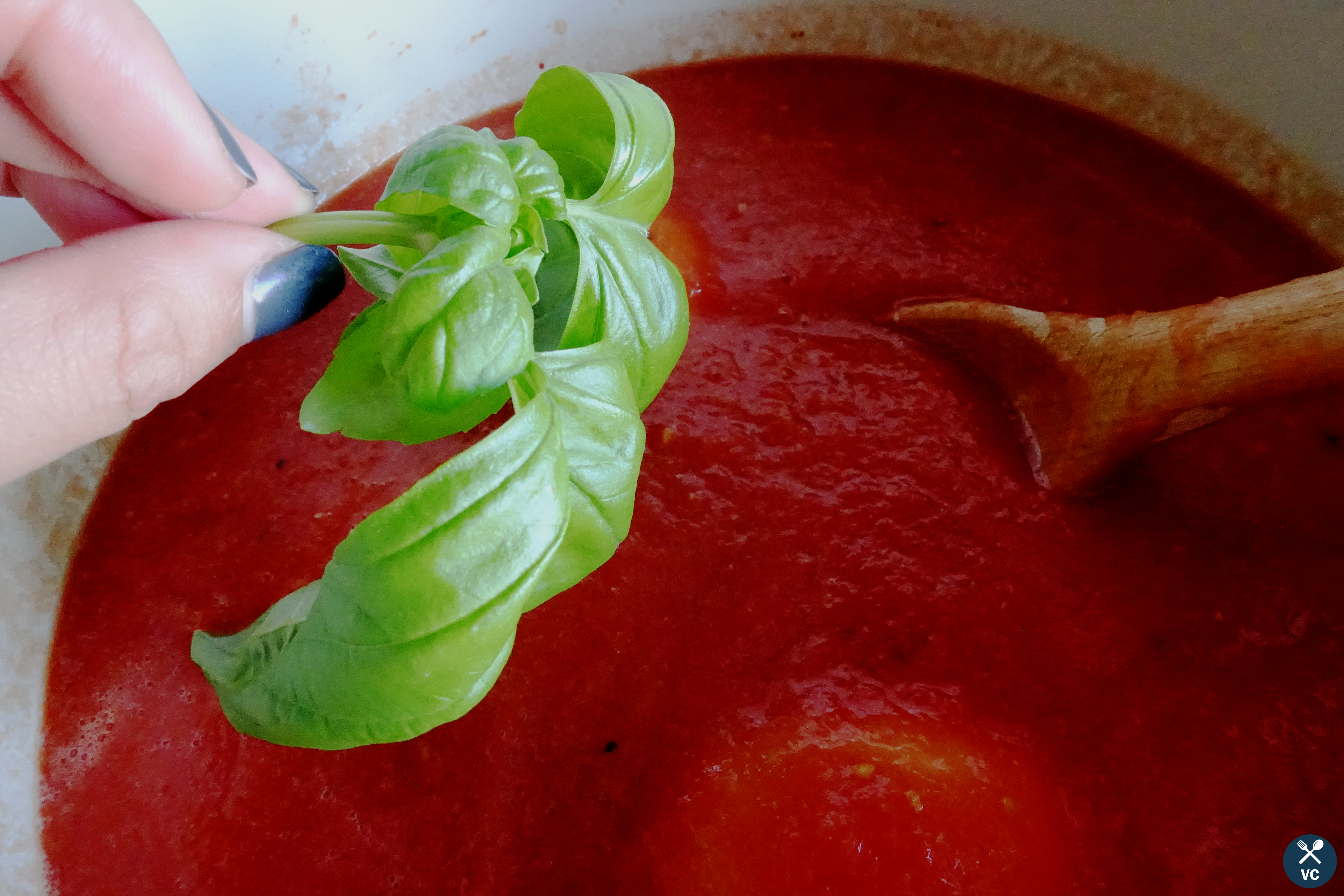 Add basil into easy marinara tomato sauce (VCintheKitchen)