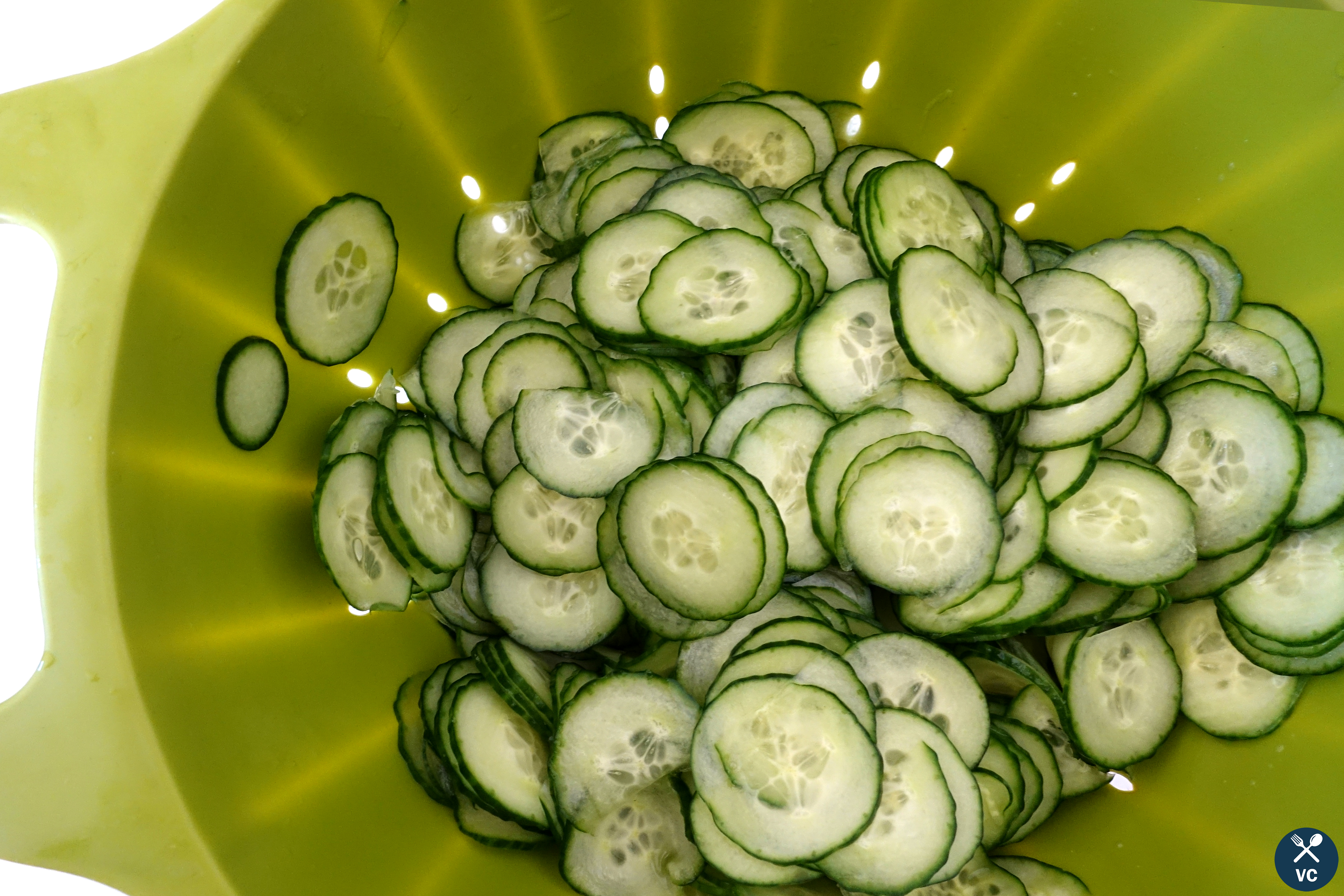 Thinly sliced cucumbers for quick Asian cucumber pickles (VC in the Kitchen)