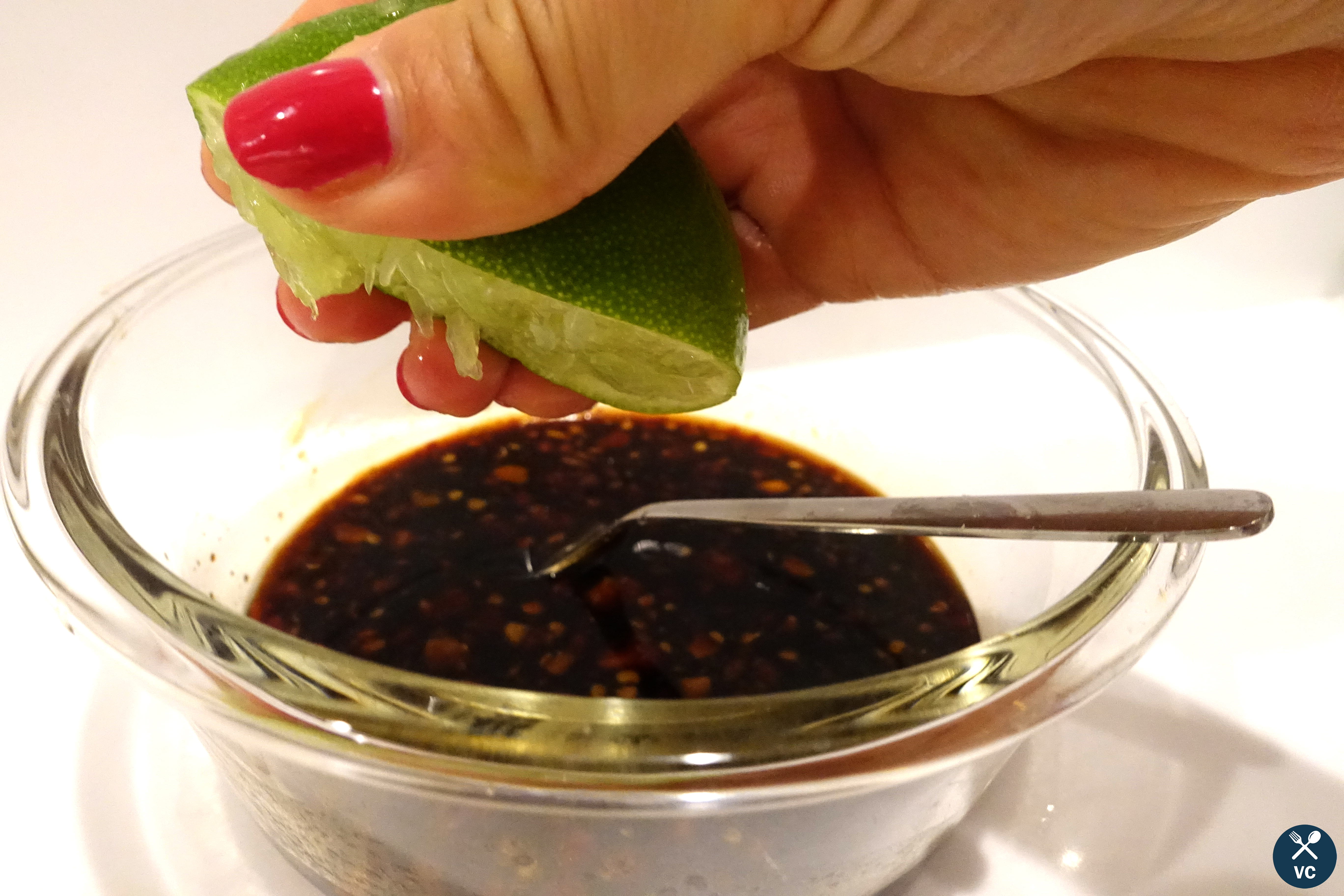 Squeezing lime for sauce of Thai beef with basil (VC in the Kitchen)