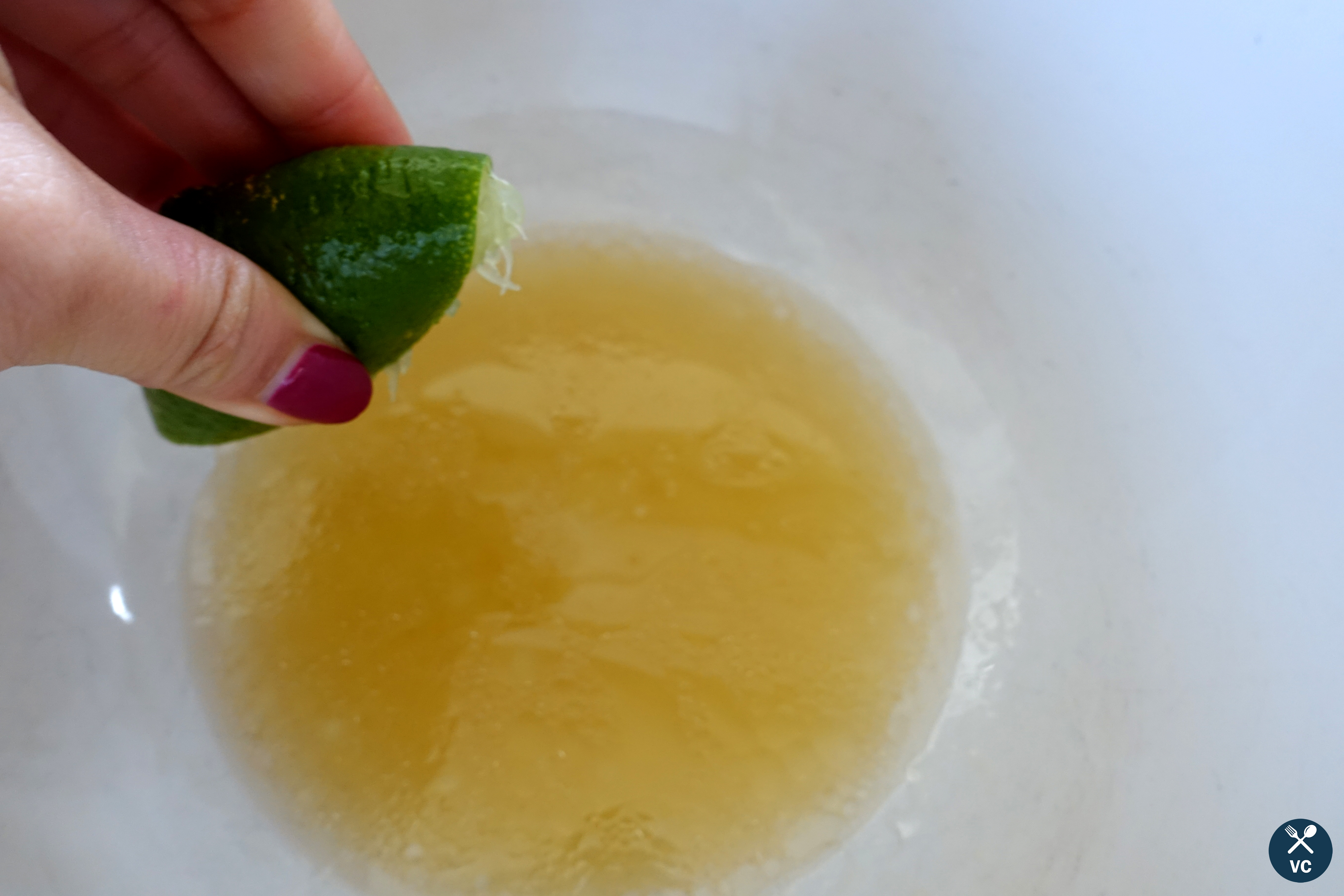 Fresh lime juice for apple and jalapeno slaw (VC in the Kitchen)