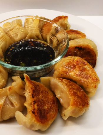 Finished cooked crispy Asian pork and cabbage dumplings (VC in the Kitchen)