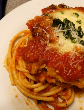 Final chicken parm on a bed of bucatini pasta (VC in the Kitchen)